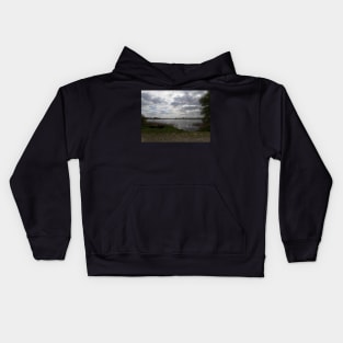 The sky is grey and white and... Kids Hoodie